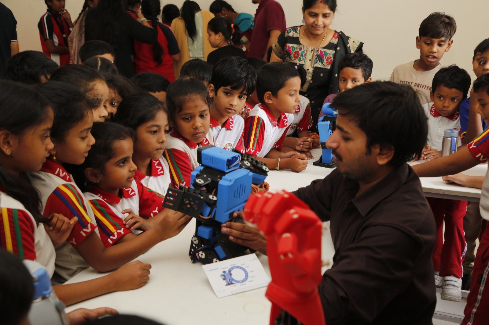 Students exploring robotics projects together